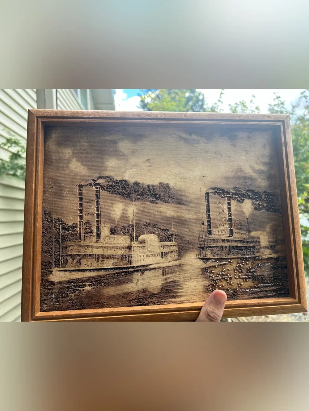 vintage wood-burned or engraved art titled 